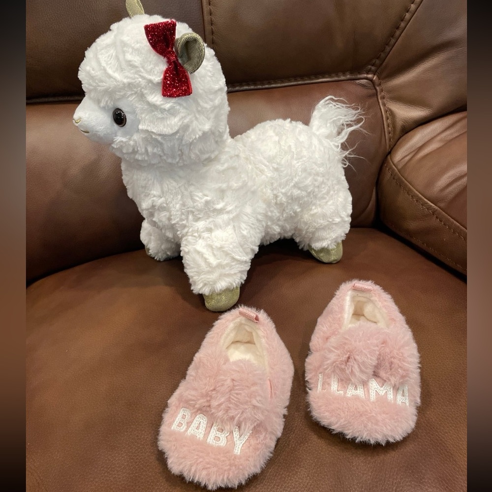 Baby llama slippers and stuffed animal